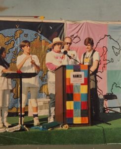 Deborah reading the names of those who died from HIV/AIDS as part of the NAMES Project AIDS Memorial Quilt, which was displayed in Houston, TX, 1992. Photo courtesy of Deborah Moncrief Bell.