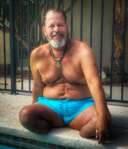 Miguel sitting poolside at his casita, Palm Springs, CA, 2021. Photo courtesy of Miguel Criado.