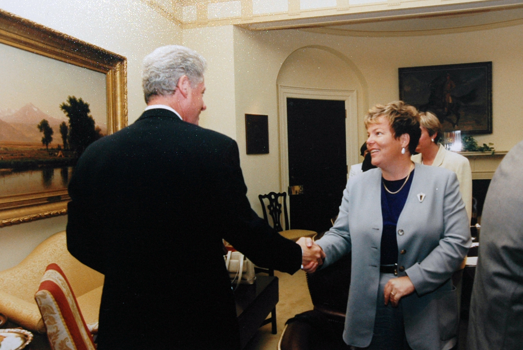 Lorri Jean meeting and shaking hands with President Bill Clinton at a convocation of LGBT leaders at the White House, Washington, DC, July 22, 1997.