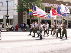 Monica marching with the Transgender Pride Flag that she designed at Pride, Atlanta, GA, 2007. Photo courtesy of Monica Helms.