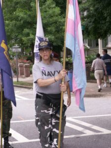 Monica holding the Transgender Pride Flag that she designed at Pride, Atlanta, GA, 2008. Photo courtesy of Monica Helms.