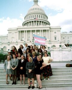 Monica Helms and other activists lobbying Congress with the Transgender Pride Flag flying in the background, 2001. Photo courtesy of Monica Helms.