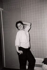 Judy posing and smiling, 1955. Photo courtesy of Judith Masur.