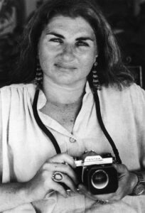 A portrait of Margaret posing with her first camera in Cuba, 1978. Photo courtesy of Margaret Randall.