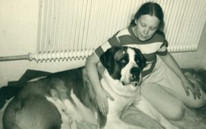 Esther holding her St. Bernard Archie in Vienna, circa 1971. Photo courtesy of Esther Rothblum.