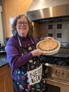 Shelley showing off her fresh cherry pie, which is a specialty of hers, at the Diamond/Belmont home in Pasadena, CA, October 27, 2021. Photo Credit: Barbara Belmont. Photo courtesy of Shelley Diamond.