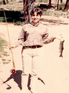 Shelley “the tomboy” holding a fish in Greer, AZ, August 1961. Photo Credit: Ronald Diamond, Shelley’s brother. Photo courtesy of Shelley Diamond.