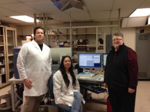 Caltech’s Flow Cytometry Cell Sorting Facility Crew at California Institute for Technology in Pasadena, CA, 2015. L-to-R: Keith Beadle, Diana Perez, and Shelley Diamond. Photo courtesy of Shelley Diamond.
