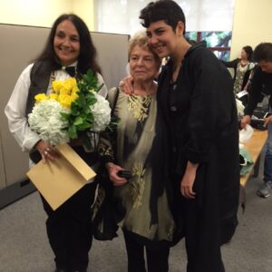 Oliva (in middle) with her partner (at left, holding flowers), May 2015. Photo courtesy of Oliva Espín.