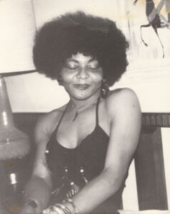 A portrait of Christy Henderson at her apartment in the 1970s. Christy shares, “When I was with the Black Panthers, this was the way I wore my hair.” Photo courtesy of Christy Henderson-Jenkins. 