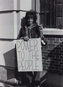 Trans civil rights activist Marsha P. Johnson protesting Christy Henderson’s institutionalization and forced electroshock therapy during the first of many demonstrations against Bellevue Hospital, New York, NY, October 5, 1970. Photo by Diana Davies. Photo courtesy of Digital Transgender Archive.