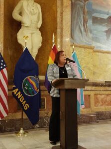 Stephanie speaking inside the Kansas State Capitol for Equality Day in Topeka, Kansas, 2020. Photo courtesy of Stephanie Byers.