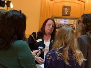 Stephanie being interviewed following a “brutal” session on the House floor in Topeka, Kansas, 2021. Photo courtesy of Stephanie Byers.