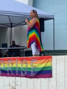 Stephanie speaking at McPherson Pride in McPherson, Kansas, 2021. Photo courtesy of Stephanie Byers.