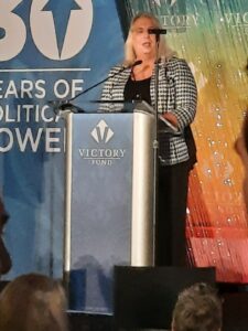 Stephanie giving a speech for Andrea Jenkins for her induction into the LGBTQ Leaders Hall Of Fame, in Washington, DC, 2021. Photo courtesy of Stephanie Byers.