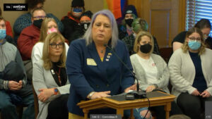 Stephanie giving opposition testimony in a committee hearing for a bill to ban trans girls in sports. Photo courtesy of Stephanie Byers.