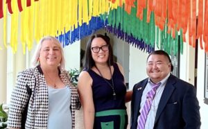 L-R Group photo of: Stephanie Byers, Andy Mara, and Emmet Schelling at the White House for Pride in Washington, DC, 2022. Photo courtesy of Stephanie Byers.