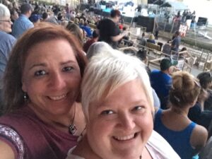 Stephanie smiles with her wife, Lori Haas, at a Joan Jett concert, Kansas State Fair, Kansas, 2015. Photo courtesy of Stephanie Byers.