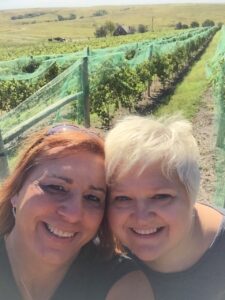 Stephanie and Lori Haas harvesting grapes at Prairie Fire Winery in Paxico, Kansas, 2015. Photo courtesy of Stephanie Byers.