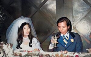 Marsha and Tad Aizumi toasting on their wedding day, Arcadia, CA, 1972. Photo courtesy of Marsha Aizumi. 