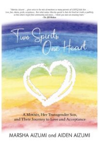 Front rainbow watercolor cover of Marsha and Aiden’s co-written book “Two Spirits, One Heart.” Publisher: Riverdale Ave Books, NYC, 2022. Photo courtesy of Marsha Aizumi.