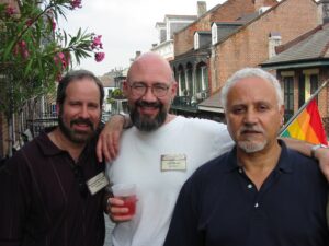 Jeff Mann (center) socializing with other writers (Dan Jaffe and Felice Picano)  at the 2003 Saints & Sinners Literary Festival. New Orleans, Louisiana, May 2003. Photo courtesy of Jeff Mann. 