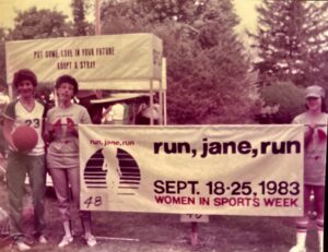 Harriet Miller and Monica Wehrle with the Run, Jane, Run participants of the Fort Wayne Three Rivers Parade. In Fort Wayne, Indiana, 1983. Photo Courtesy of Harriet Miller and Monica Wehrle.
