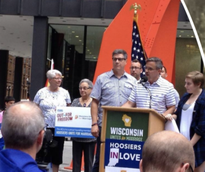 Monica Wehrle, Harriet Miller and other ACLU-Marriage Equality plaintiffs speaking at a press conference in Chicago, Illinois, 2014. Photo Courtesy of Harriet Miller and Monica Wehrle.