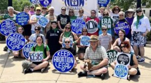 Harriet Miller and Monica Wehrle with members of North East Now organization at a 
protest. In Fort Wayne, Indiana, 2024. Photo Courtesy of Harriet Miller and Monica Wehrle.