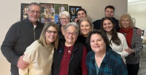 Harriet Miller and Monica Wehrle (center) smile in their Ohrn-family group photo during a Thanksgiving celebration. In Carmel, Indiana, 2024. Photo Courtesy of Harriet Miller and Monica Wehrle.