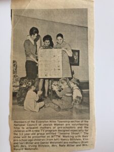 Grayscale newspaper clipping of Harriet Miller (middle adult) with her two daughters Kim and Sari in an article photo about Sesame Street in classrooms. Skokie, Illinois, 1970’s. Photo Courtesy of Harriet Miller and Monica Wehrle.
